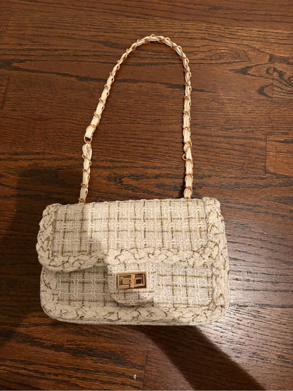 Fabric shoulder bag with gold stitching
